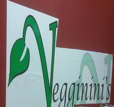 Veggininis Paradise Cafe Logo